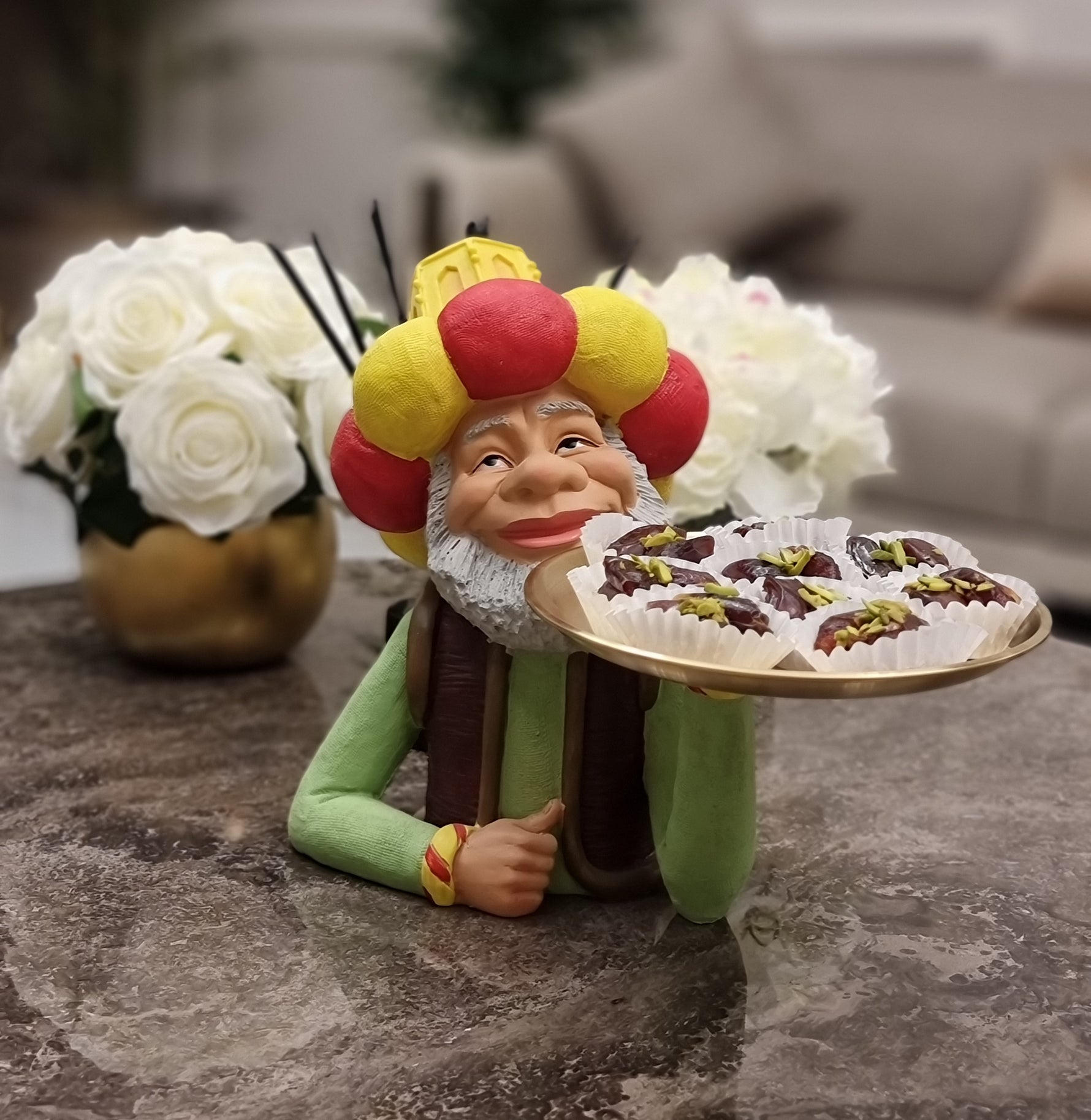 Fananees characters - Alselfi old man holding presenting plate